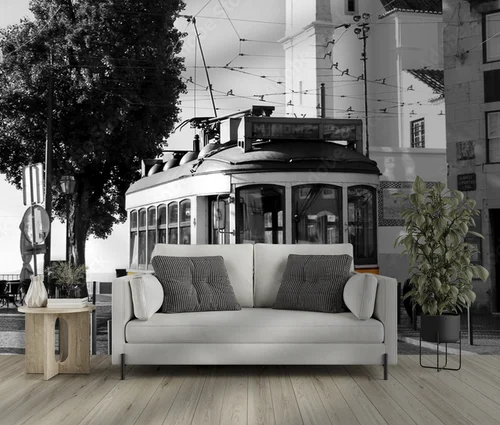 Uroklisbona: żółty tramwaj na tle monochromu