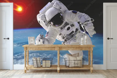 Kosmicznie fascynująca kompozycja astronauty i meteorytu