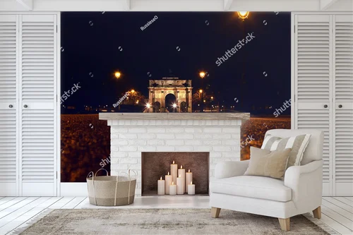 Nocny widok na Arc de Triomphe w Paryżu