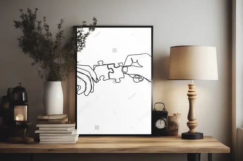 Ręce łączące puzzle w delikatnych tonacjach bieli