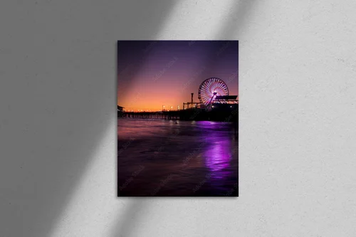 Zachwycający zachód słońca nad molo w Santa Monica