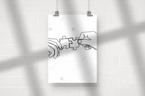 Ręce łączące puzzle w delikatnych tonacjach bieli