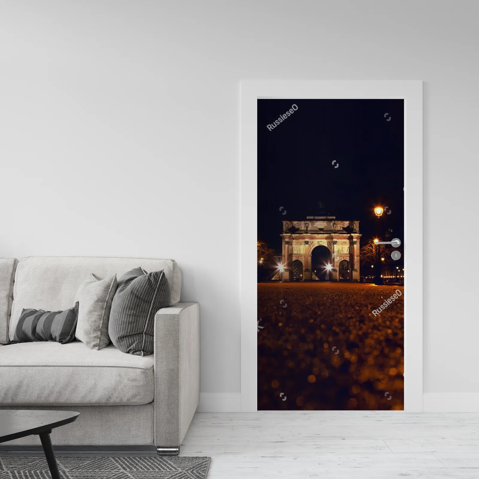 Nocny widok na Arc de Triomphe w Paryżu