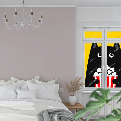 Radosny kotek z popcornem w kinowej atmosferze
